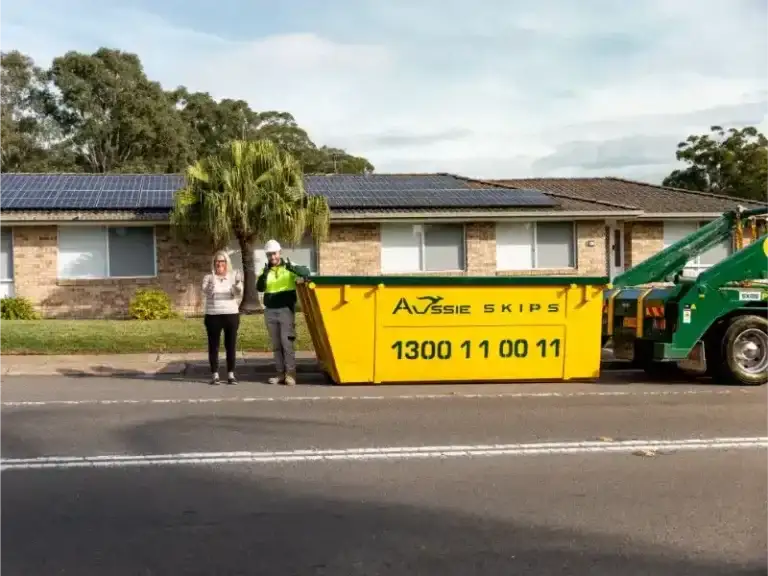Aussie Skips truck and skip bin outside a Sydney home
