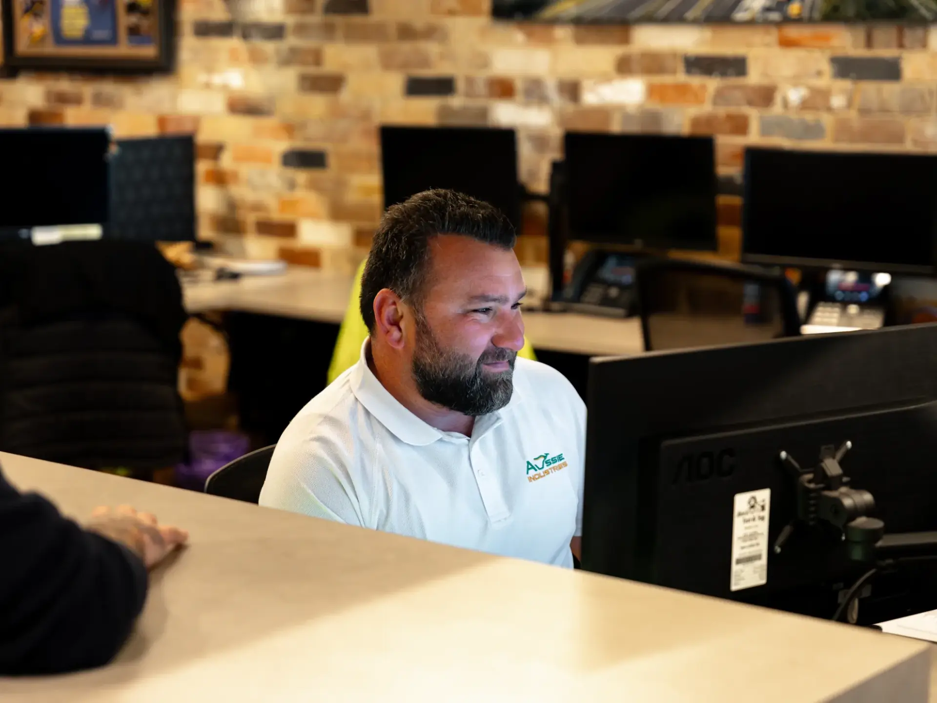 Aussie Skips team member helping a customer
